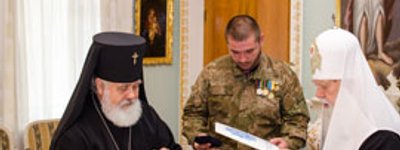 Патріарх Філарет нагородив церковними орденами бійців Української добровольчої армії