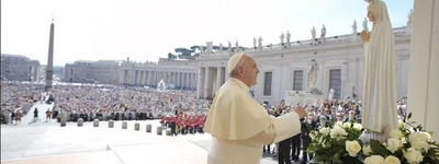 Pope Francis in front of a statue of Our Lady of Fatima on the feast day of Our Lady of Fatima, on May 13, 2015, in St. Peter's Square during the Wednesday General Audience