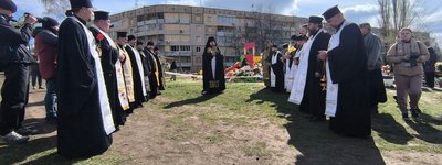 A memorial service for the victims held on a playground in Kryvyi Rih