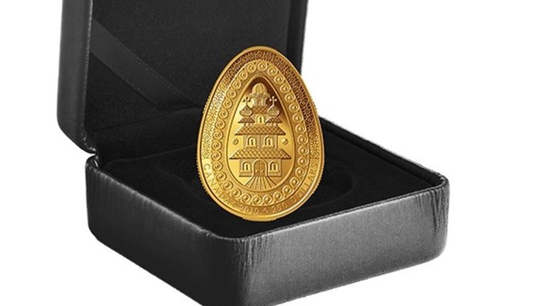 В Канаде выпустили золотую монету в форме украинской писанки - фото 1