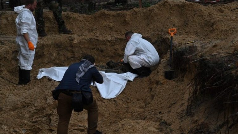 Ukraine to exhume mass graves in recaptured territory - фото 1