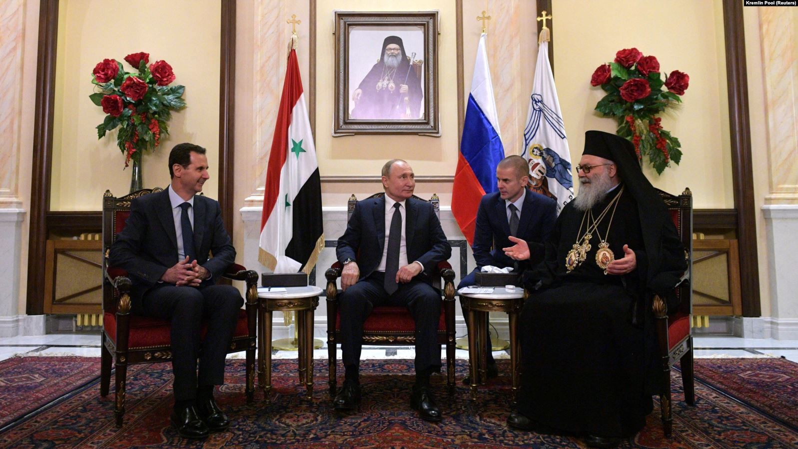 Президент Росії Володимир Путін (посередині), президент Сирії Башар Асад (ліворуч) і патріарх Антіохійський Іоанн X. Сирія, Дамаск, 7 січня 2020 року - фото 64557