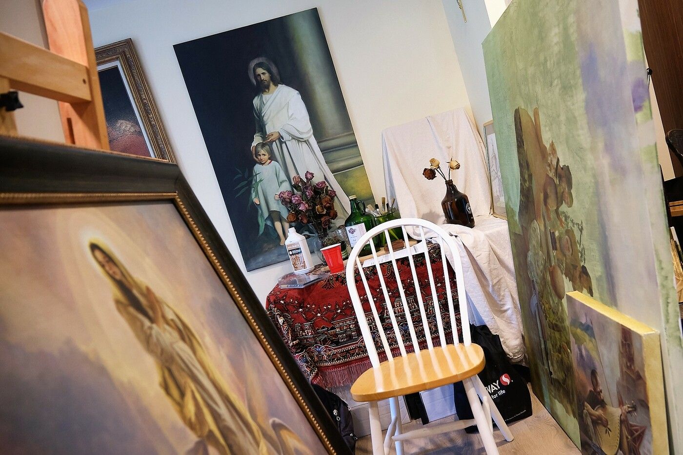 Kolodka is not a traditional iconographer by training, and his studio is mostly filled with realist religious artwork and political paintings about the war in his home country of Ukraine. - фото 118821