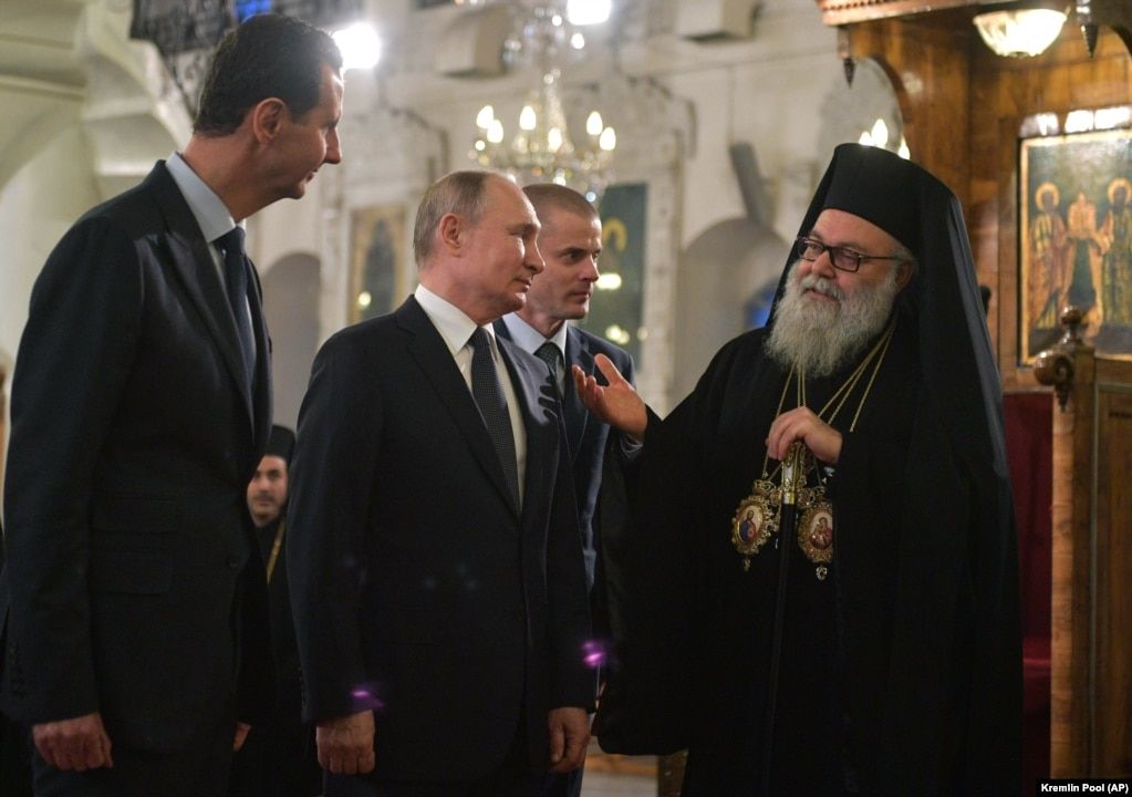 Президент Росії Володимир Путін (посередині), (нині вже скинутий) президент Сирії Башар Асад (ліворуч) і патріарх Антіохійський Іоанн X. Сирія, Дамаск, 7 січня 2020 року - 145902 Президент Росії Володимир Путін (посередині), (нині вже скинутий) президент Сирії Башар Асад (ліворуч) і патріарх Антіохійський Іоанн X. Сирія, Дамаск, 7 січня 2020 року - фото 145902
