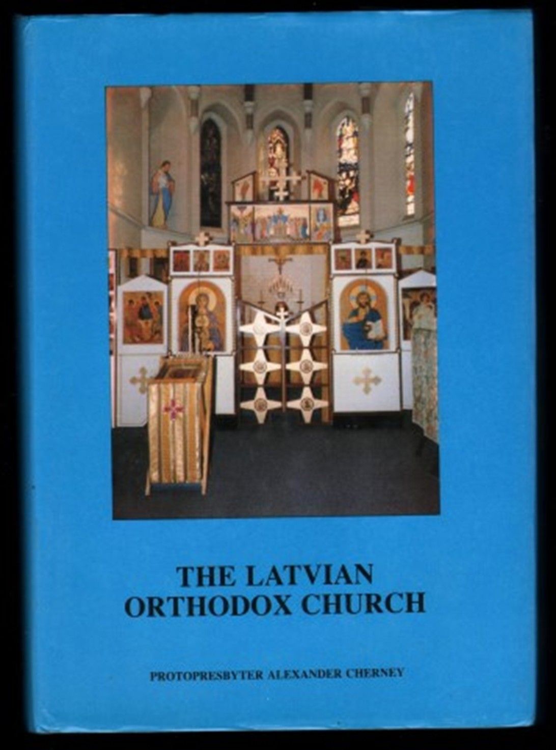 Книга протопресвитера А. Черныйса (Cherney) „The Latvian Orthodox Church”, 1985. На обложке фотография иконостаса в храме ЛПЦ в Изгнании в Лондоне, в котором служил протопресвитер Александр - 164297 Книга протопресвитера А. Черныйса (Cherney) „The Latvian Orthodox Church”, 1985. На обложке фотография иконостаса в храме ЛПЦ в Изгнании в Лондоне, в котором служил протопресвитер Александр - фото 164297